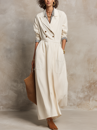 Elegantes elfenbeinfarbenes, doppelt geknöpftes Trench-Maxikleid