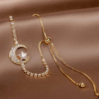 Armband mit Mondanhänger aus Zirkonium und Gold