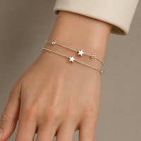 Silbernes Armband mit Sternen