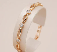 Elegantes goldenes Armband mit Zirkonia