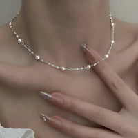 Elegante Kette mit glänzenden Perlen